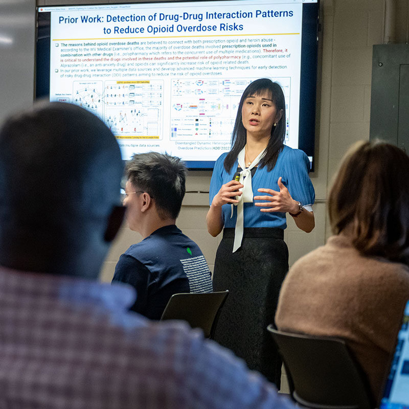 Prof. Fanny Ye teaching in a classroom